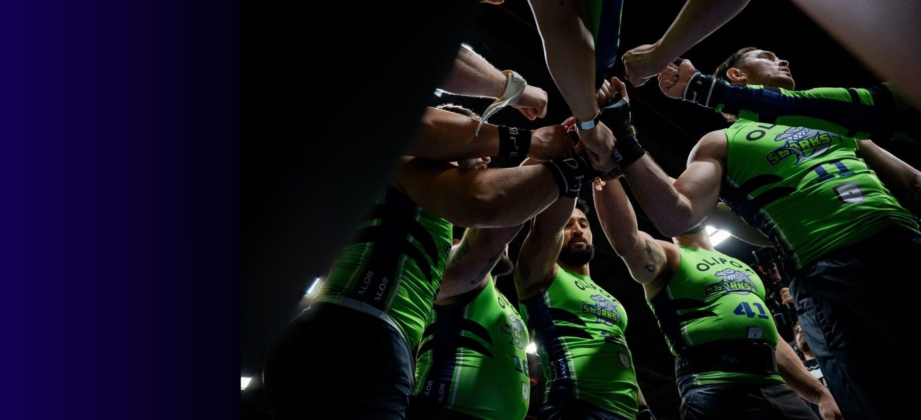 Florida Sharks team putting their hands together
